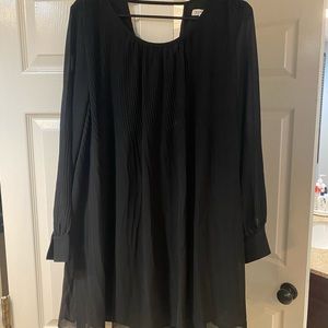 Flowy, black dress with pleated detail. Size small.